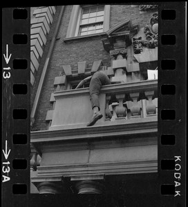 Thumbnail for Student climbs over balcony of Boston University administration building during sit-in