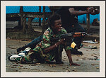 Defending Monrovia. A young Liberian fighter defends the Liberian capital, Monrovia, as rebel militia attempt to take control of the country. The world's attention turned to Liberia in July 2003 at the climax of the civil war, which ended President Charles Taylor's rein