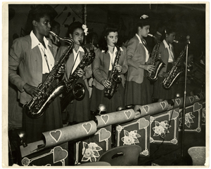 The "Sweethearts" saxophone section in performance, September, 1944.] [Black-and-white photoprint.