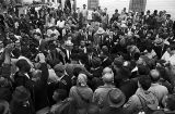 Reporters crowding around Martin Luther King Jr. and other marchers in Montgomery, Alabama, on the final day of the Selma to Montgomery March.