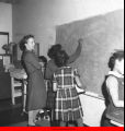 Girls at a chalkboard at Kenwood Study Center