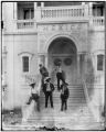 Visitors from Mexico on the steps of Mexico's pavilion for the Louisiana Purchase Exposition