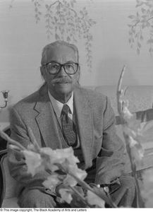 Dr. Marion J. Brooks seated for his portrait