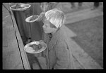 [Untitled photo, possibly related to: Negroes in the lineup for food at mealtime in the camp for flood refugees, Forrest City, Arkansas]