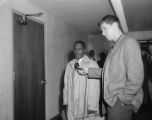 Attorney Arthur Shores being interviewed at a trial held after African American passengers were arrested for attempting to integrate city buses in Birmingham, Alabama.