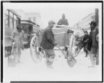 [African American men shovelling snow in street, Washington, D.C.(?)]