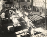 "Scene in the Tuskegee Institute laundry which gives employment to approximately 90 students and averages 11,000 pounds of flat work and 25 hundred shirts per week."