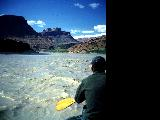 Thumbnail for View of the Colorado River in Glen Canyon from a raft. Leo Walters in front of raft.