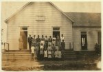 New Hope School #41. 4 miles northwest of Shawnee. 31 present. Opened October 2nd--8 months term. Principal, Mr. J.H. Harrison, P.O. Route 6, Shawnee, says there ought to be twice that number present and will be after cotton picking is over. Lewis W. Hine. See W.H. Swift Report.  Location: Potawotamie County, Oklahoma.