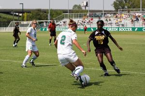 Amanda Mitchell kicking the ball