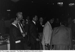 Photograph of a crowd of unidentified people standing close to one another