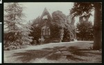 Thumbnail for Exterior view of a vine-grown Victorian home in Redlands, ca.1900