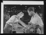 Manpower. Negro aircraft propeller workers. Americans of various racial groups contribute to the war effort. One worker adjusts the blade in a vise while another reads the angle in a large Eastern plant producing propellers for military aircraft. Curtiss-Wright Propeller Division. Caldwell, New Jersey