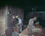 Employees working at Robinson Foundry, Inc., probably in Montgomery, Alabama.