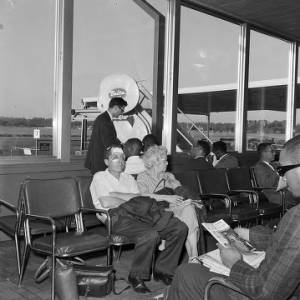 Freedom Rider James Peck seated in the waiting area of the airport in Birmingham, Alabama, waiting to board a flight for New Orleans.