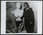 Dr. Brown with a bust of Alice Freeman Palmer