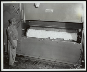 Employee operating loose pulp dryer at Hercules Hopewell plant