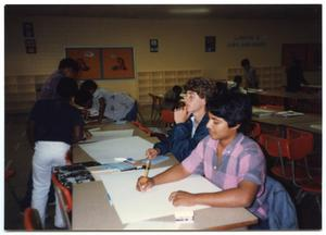 Teenagers Writing and Drawing at Poster Art Contest