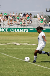 Amanda Johnson preparing to kick the soccer ball