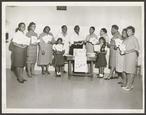 Camp Fire Girls Leaders and Girls With Display