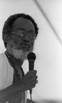 An African American man performs a the Watts Towers Festival of Drums, Los Angeles, 1982