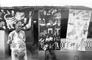 Appliqué workers, in street, Abomey, Benin