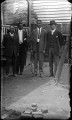 Group portraits of African American men taken outdoors, from the William E. Baker glass negative collection.
