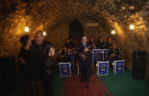 Technical Sergeant (TSGT) Bill King with the United States Air Force in Europe (USAFE) Jazz Band, The Ambassadors, performs the alto saxophone solo of Glen Millers "In the Mood" at a benefit performance in the old city area of Baku, during the Caspian Jazz and Blues Festival, in Azerbaijan