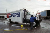 Peter Payne and Kelvin Mills washing Pepsi trucks at the Buffalo Rock Company at 6215 Old Madison Pike Southwest in Huntsville, Alabama.