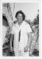 Annie Mae Peterman Martin posing against tree in yard of her daycare, Abbeville, AL.