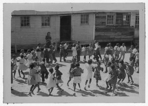 Photograph of African American schoolchildren square dancing, Manchester, Georgia, 1953