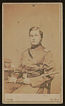 [First Lieutenant Frederick E. Beardslee of Quartermaster's Dept. U.S. Volunteers Infantry Regiment and Signal Corps Regular Army Infantry Regiment in uniform with sword]