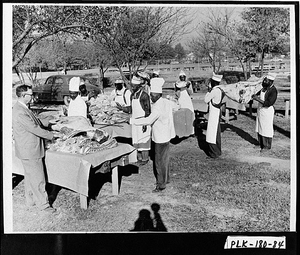 Photograph of preparing beef ribs for "Employees' Field Day," Rockmart, Polk County, Georgia, 1950 Sept.