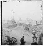 [Charleston, S.C. Federal squadron dressed with flags for the anniversary of Maj. Robert Anderson's surrender (1861) seen from a parapet of Fort Sumter]