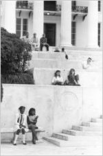 Small group watching a rally of the Ku Klux Klan from the steps of the Capitol in Montgomery, Alabama.