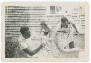 Digital image of Taylor family members painting furniture on Martha's Vineyard