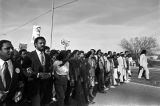 Marchers during the 20th anniversary reenactment of the Selma to Montgomery March in Selma, Alabama.