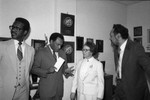 Ruth Washington talking with others in an office, Los Angeles, 1984