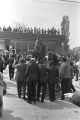 T. Y. Rogers and Jesse Jackson on the cart carrying Martin Luther King, Jr.'s casket during the funeral procession on Auburn Avenue.