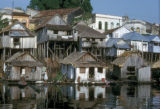 Brazil, stilt houses along river in Manaus