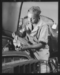 Fort Knox. Negro mechanics. He plays an important part in keeping army tansport fleets rolling. This Negro soldier, who serves as truck driver and mechanic, handles many repair and adjustment jobs at Fort Knox, Kentucky