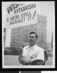 Demonstrator attends march in support of New York 12, 1948, Los Angeles