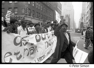 Harlem Peace March: Progressive Labor Party march behind banner reading 'Get out of Vietnam now' African American antiwar protesters marching through the New York streets