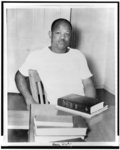 [Henry Doyle seated at a desk at the University of Texas]