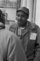 Scott B. Smith of SNCC speaking with John Davis of SCLC, in front of the Barbour County courthouse in Eufaula, Alabama.