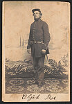 [Private Elijah Rowe of Co. G, 24th New York Infantry Regiment in uniform with sword in front of painted backdrop showing landscape with a lake]