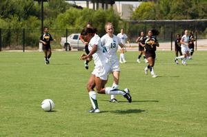 Amanda Johnson and Danielle Herron on field