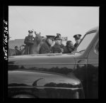 Detroit, Michigan. Riot at the Sojourner Truth homes, a new U.S. federal housing project, caused by white neighbors' attempt to prevent Negro tenants from moving in. Police arresting a Negro