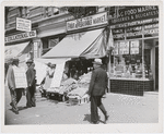 Lenox Fruit & Vegetable Market being picketed by labor union supporter, Harlem, New York City, 1939