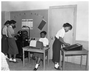 Students Operating Office Machines